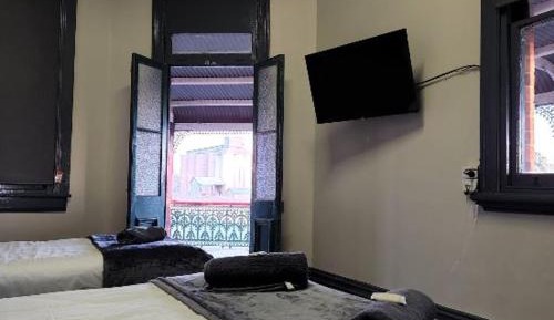 Triple Room with Shared Bathroom