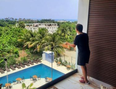 One-Bedroom Apartment with Balcony and Sea View