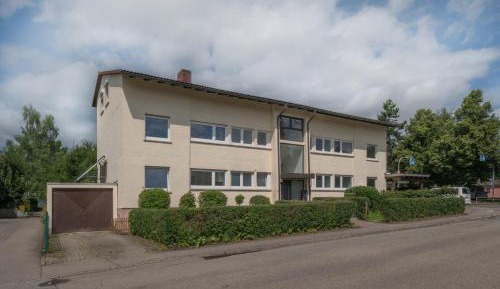 Four-Bedroom Apartment with Balcony 