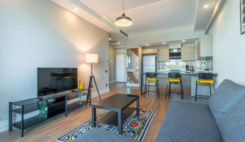 One-Bedroom Apartment with Balcony and Water View