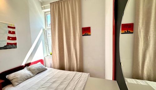 Four-Bedroom Apartment with Balcony 