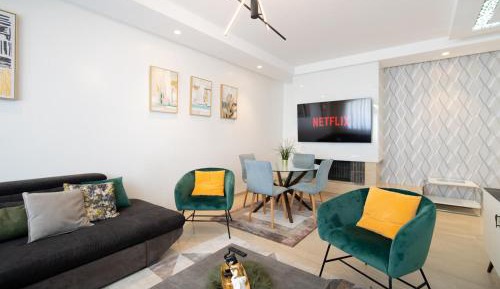 Three-Bedroom Premium Apartment with Balcony