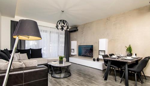 One-Bedroom Apartment with Balcony and City View