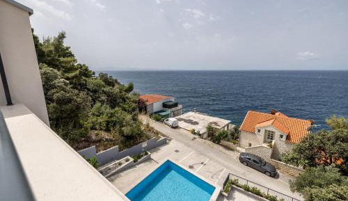 One-Bedroom Apartment with Balcony and Sea View
