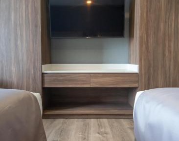 Deluxe Queen Room with Two Queen Beds and Balcony - City View