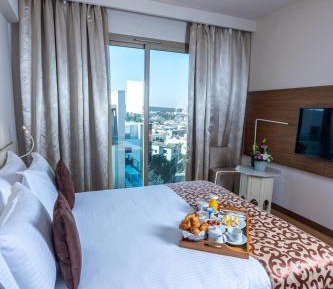 Deluxe Room King Size Bed City View