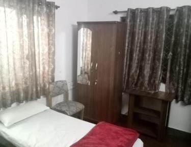 Single Bed in Dormitory Room