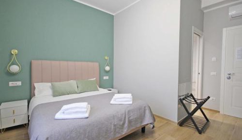 Quadruple Room with Private Bathroom