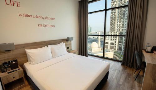 Deluxe Room King Bed with City View (includes 25% off F&B)