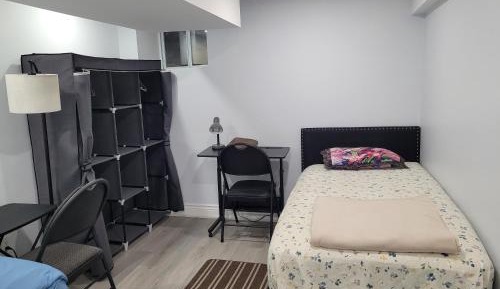 Single Bed in Dormitory Room