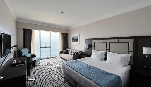 King Room with One King Bed and Sofa Bed - Sea View