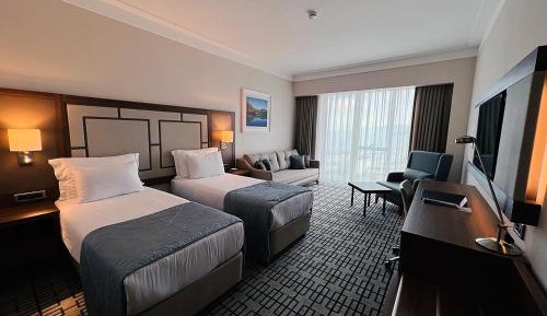 Twin Room with Two Twin Beds and Sofa Bed - City View