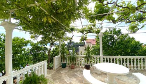Four-Bedroom Apartment with Sea View