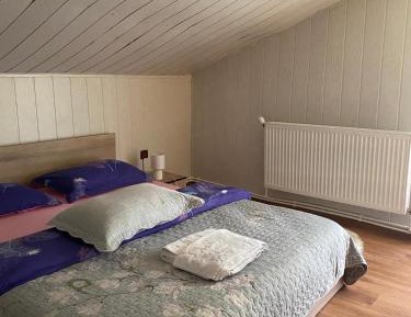 Queen Room with Shared Bathroom