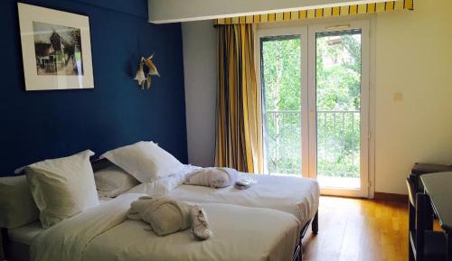 Triple Room (2 Adults + 1 Child)