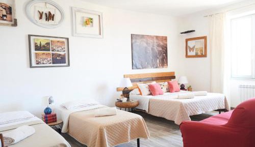 Quadruple Room with Private Bathroom
