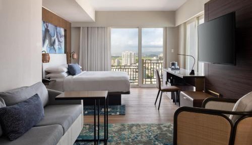 King Studio Suite with City and Pool View