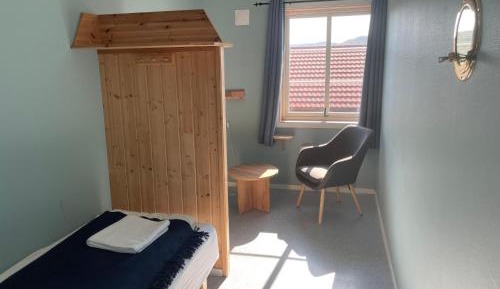 Single Room with Shared Shower and Toilet