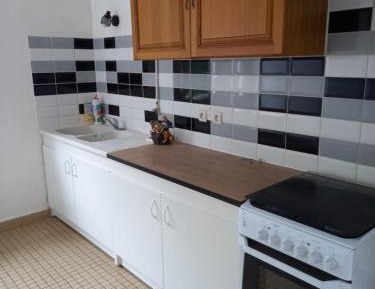 Three-Bedroom Apartment with Balcony