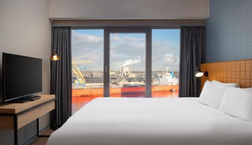 One-Bedroom Corner Suite - High Floor
