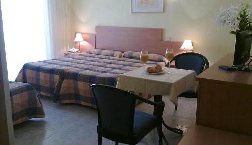 Triple Room (2 Adults + 1 Child )