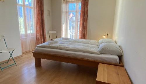 One-Bedroom Apartment with Balcony and Mountain View  