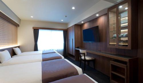 Universal Quadruple Room - Non-Smoking (4 Single beds)