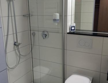 Double room with small bed, annex building