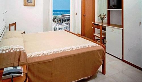 Comfort Quadruple Room with Sea View and Balcony