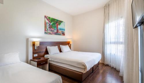 Standard Triple Room with Balcony