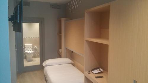 Quadruple Room with Balcony