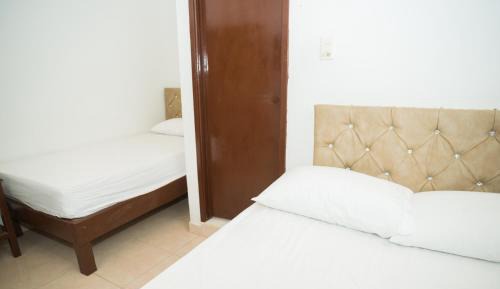 Single Bed in Dormitory Room