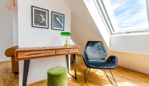 One-Bedroom Apartment with Balcony and City View