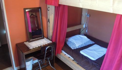 Upper Bunk Bed in Female Dormitory Room
