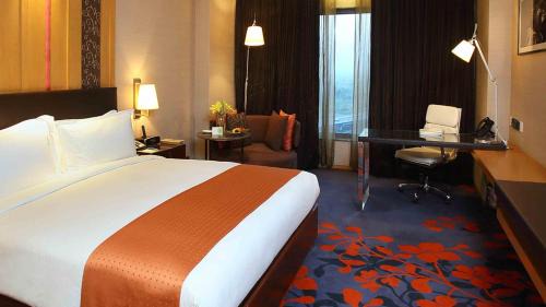 Standard King Room with 15% discount on Laundry, 15% discount on Food and Soft Beverage, Happy Hours between 12:00 noon to 19:30 Hrs & Late Check out till 15:00 Hrs (subject to availability)
