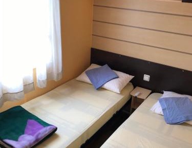 Single Bed in Dormitory Room