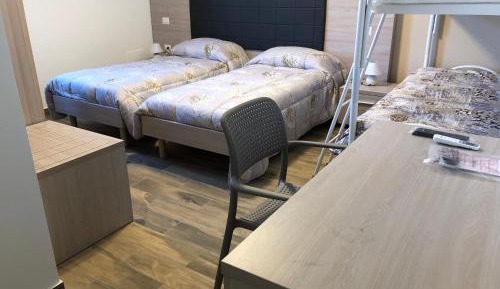 Quadruple Room with Private Bathroom