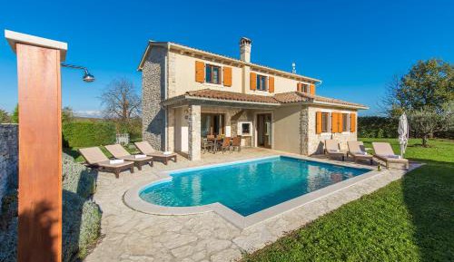 Four-Bedroom Villa with Private Pool and Sauna