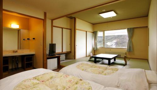 Quadruple Room with Shared Bathroom