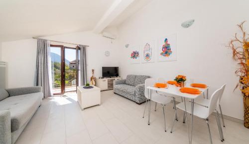 One-Bedroom Apartment with Balcony and Partial Sea View