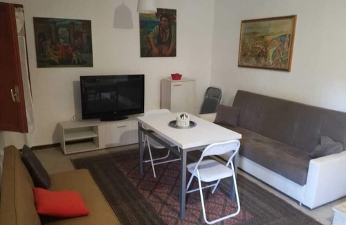 Partanna House | White house apartment with garden