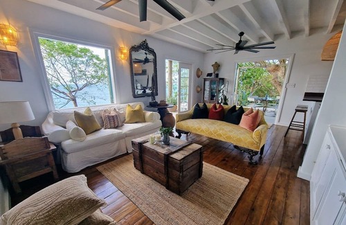 Wesley Will House | Spectacular clifftop house with hot tub next to sandy beach, stunning sea views