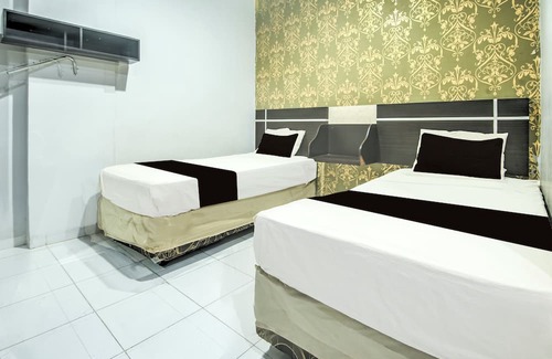 Panakkukang Hotel | OYO 94781 Hotel Lucky Inn Makassar