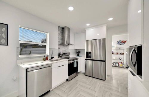 Ybor City House | Relaxing AF Tampa Home with Hot Tub, Outside Fun, and TVs in every room!