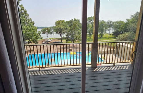 Grove House | Giant10-bedroom lakefront home with large pool, hot tub, and dock