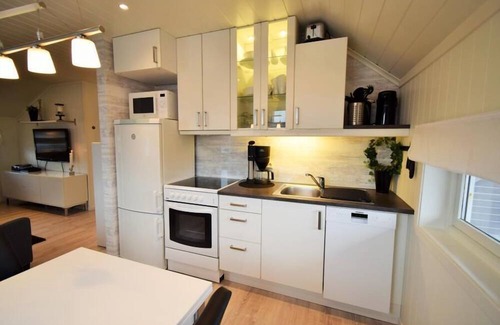 Farsund Apartment | Fewo 'Listastrand 2', Borhaug - Tjörvehavn, Listaland, South-Norway Agder, very chic apartment with large roof terrace and sea view at the bay Bausje with long beach, 4-5 adults or 2 adults and 3 children, 2 bedrooms, 1 shower room, WLAN Internet.