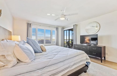 Bethune Beach Condo | Riverfront / Boat Dock / Pool / Walk to Beach / Cedar Island Club
