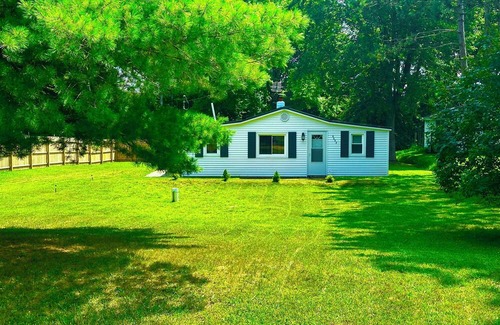 Lake Cabin | Bear Lake Retreat a cozy cabin situated walking distance to Private Bear Lake.