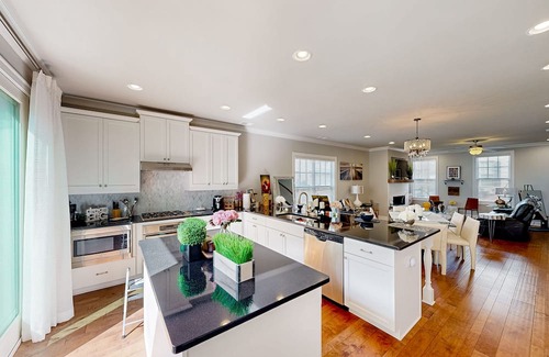 Roswell House | Peaceful & sun-filled getaway with courtyard, grill, games, & lovely fireplace