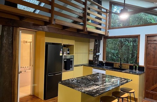 Malanda Cabin | Figtree Getaway Tree house Spa cabin king bedroom plus loft 2 bedroom